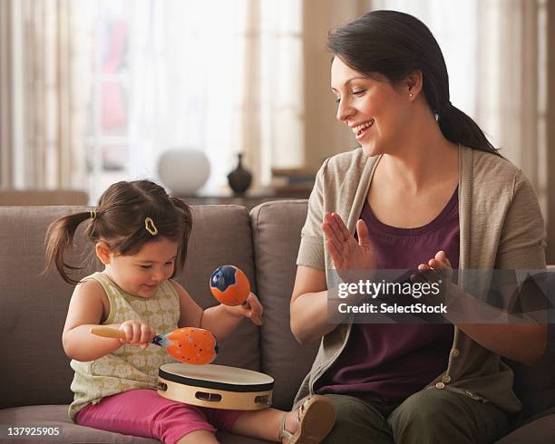 Clapping Mother 647 Mom Clapping With Baby Stock Photos, High-Res Pictures, and Images ...