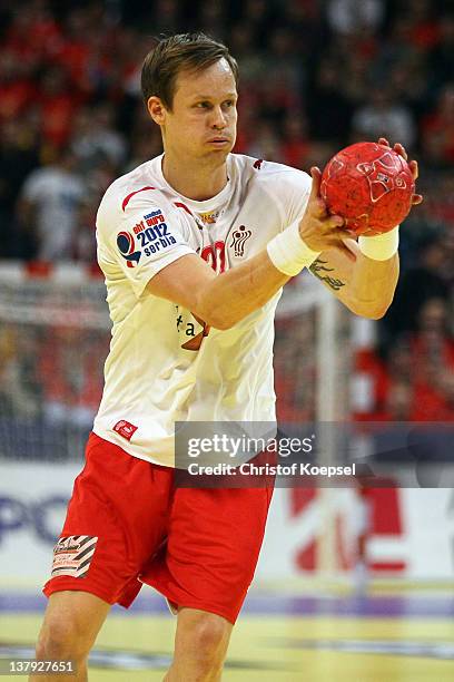 Kasper Soendergaard Sarup of Denmark passes the ball during the Men's European Handball Championship final match between Serbia and Denmark at...