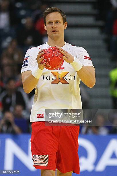 Kasper Soendergaard Sarup of Denmark passes the ball during the Men's European Handball Championship final match between Serbia and Denmark at...