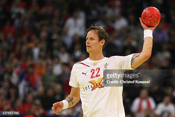 Kasper Soendergaard Sarup of Denmark passes the ball during the Men's European Handball Championship final match between Serbia and Denmark at...