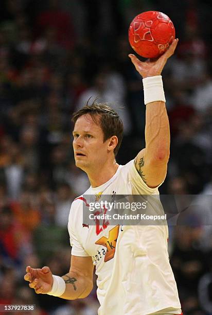 Kasper Soendergaard Sarup of Denmark passes the ball during the Men's European Handball Championship final match between Serbia and Denmark at...