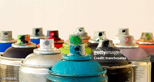 range of aerosol cans used for graffiti macro - spray paint stock pictures, royalty-free photos & images