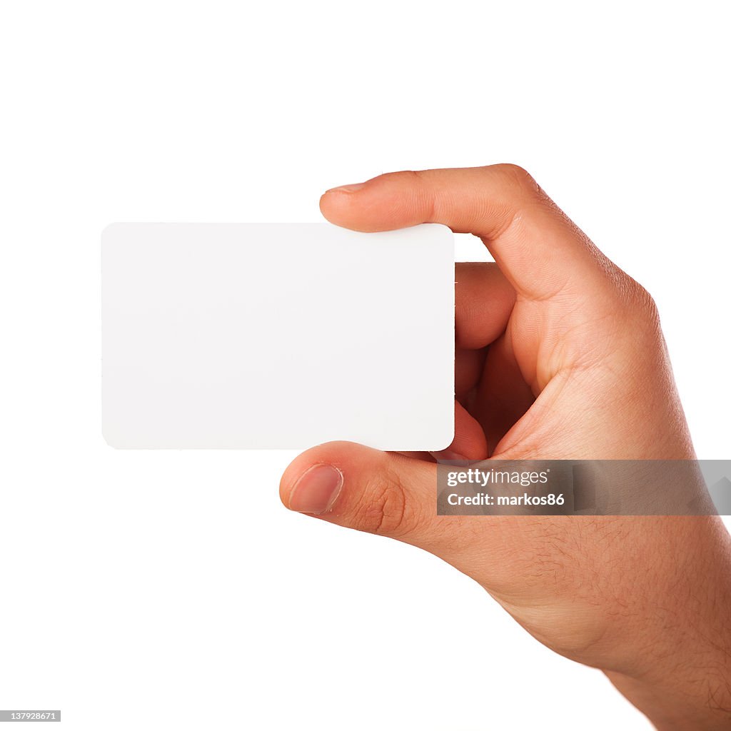 Hand holding a blank business card