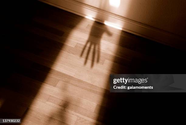 spooky shadow - huiselijk geweld stockfoto's en -beelden
