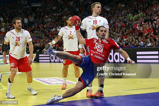 Alem Toskic of Serbia scores a goal during the Men's European Handball Championship final match between Serbia and Denmark at Beogradska Arena on...