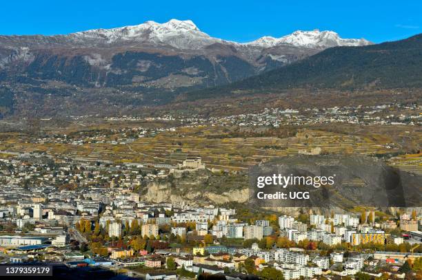 Sion, capital of the canton of Valais, Basilique de Val�re, left, and Tourbillon castle, right, Sion, Valais, Switzerland.