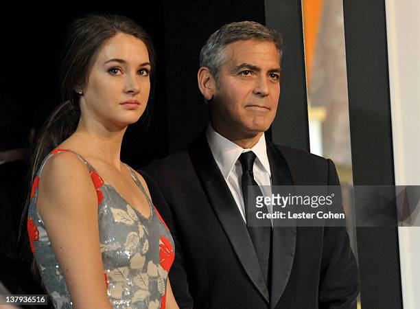 Actors Shailene Woodley and George Clooney attend The 18th Annual Screen Actors Guild Awards broadcast on TNT/TBS at The Shrine Auditorium on January...