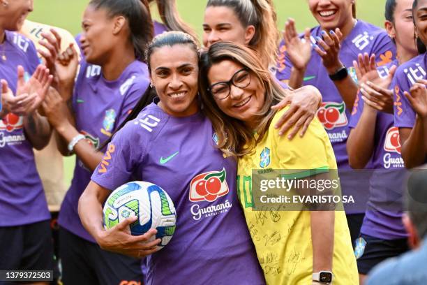 Brazilian First Lady Rosangela "Janja" da Silva poses for a picture with player Marta during a meeting with the women's soccer national team at the...