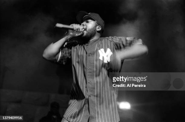 Rapper Ice Cube performs in concert in a New York Yankees Baseball Jersey at The Apollo Theater on February 22, 1992 in New York City.