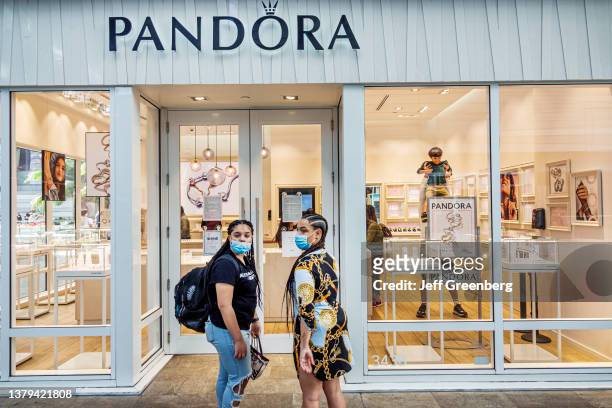 Miami, Florida, Brickell City Centre, Pandora jewelry store with two women entering.