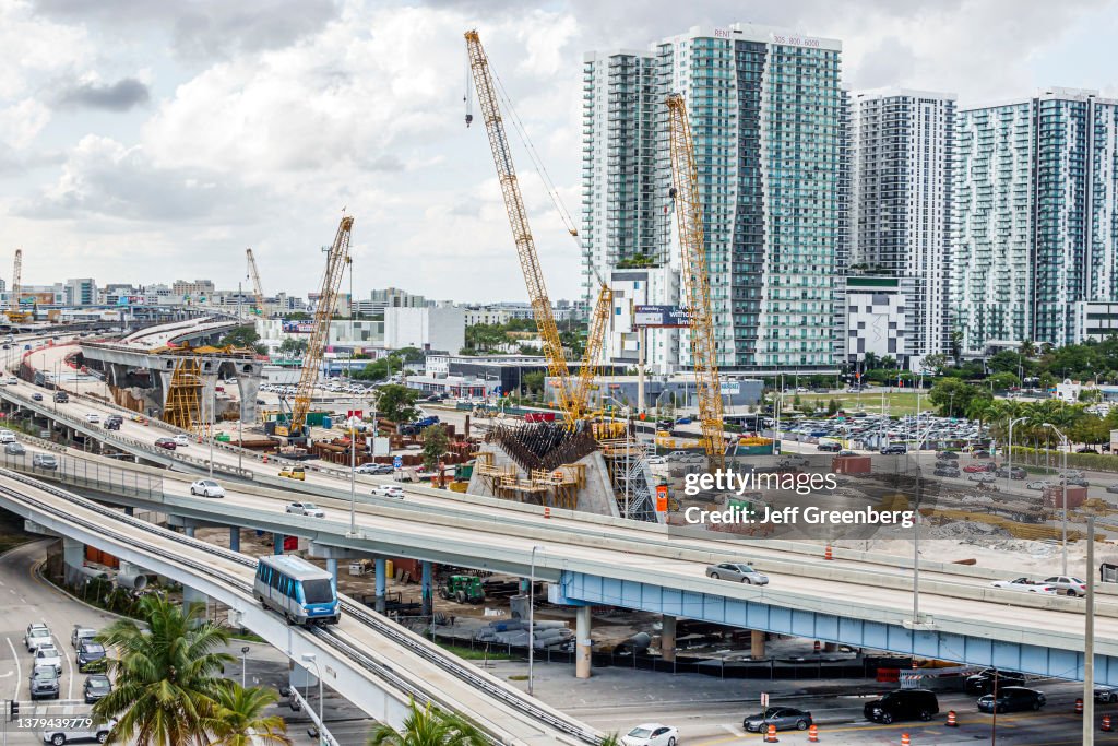 Miami, Florida, I-395 highway Dolphin Expressway MacArthur Causeway, road construction site with Metromover rail shuttle