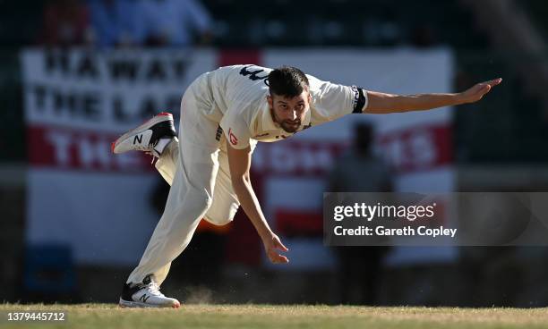 Mark Wood of England bowls during day four of the tour match between West Indies President's XI and England XI at Coolidge Cricket Ground on March...