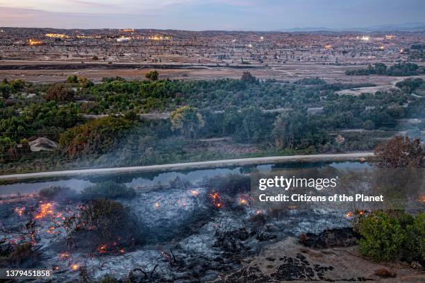 Wildfire breaks out on the edge of the Kern River Oil Field in Bakersfield. The oil field is the third largest oil field in California and is the...