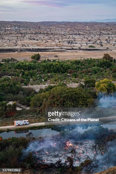 Wildfire breaks out on the edge of the Kern River Oil Field in Bakersfield. The oil field is the third largest oil field in California and is the...
