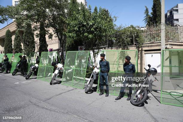 The Iranian police guard the Swedish embassy during a protest of the burning of a Quran in Sweden. On Wednesday, Salwan Momika who identified himself...