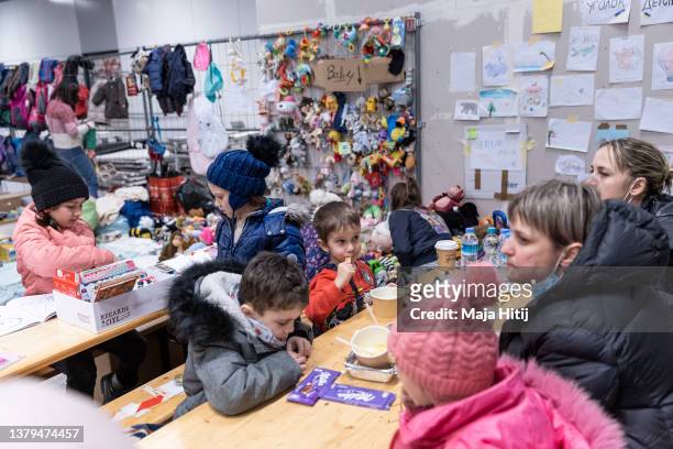 Children play after arriving with their families after fleeing Ukraine at Hauptbahnhof main railway station on March 4, 2022 in Berlin, Germany....