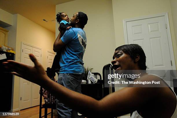 Kyon-Teka Adams with her husband Ronald Bell and their daughter Miracle Sky Bell, 2-years-old in their apartment on Meigs Place NE, Washington DC on...