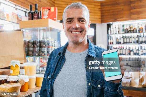 contactless payment at convenience store - liquor store stock pictures, royalty-free photos & images