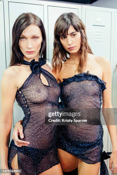 Bella Hadid & Mica Argañaraz pose backstage during the Coperni Womenswear Fall/Winter 2022-2023 show as part of Paris Fashion Week on March 03, 2022...