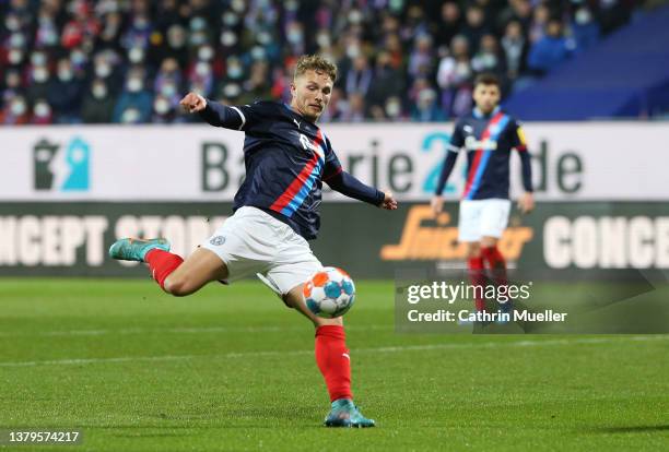 Jann-Fiete Arp of Holstein Kiel shoots the ball during the Second Bundesliga match between Holstein Kiel and SC Paderborn 07 at Holstein-Stadion on...