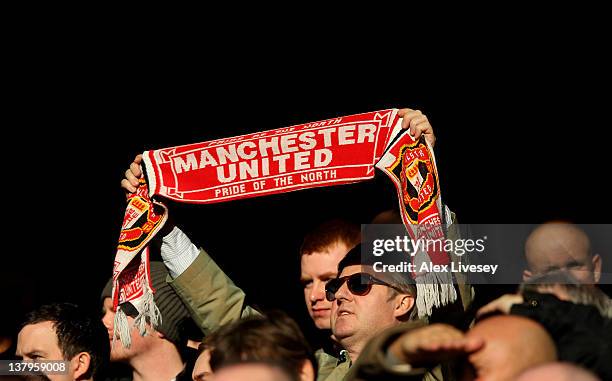 Manchester United fan shows his support during the FA Cup Fourth Round match between Liverpool and Manchester United at Anfield on January 28, 2012...