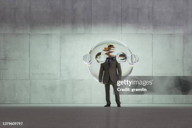 person in glasblase gefangen - people inside bubbles stock-fotos und bilder