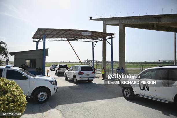 United Nations vehicles arrive ahead of a press conference by UN Secretary-General Antonio Guterres, in Port-au-Prince on July 1, 2023. UN...