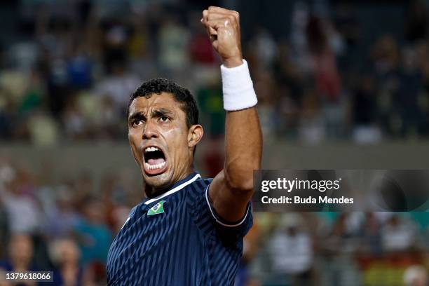 Thiago Monteiro of Brazil celebrates a point against Jan-Lennard Struff of Germany during their singles match on Day One of the 2022 Davis Cup...