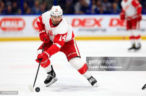 Robby Fabbri of the Detroit Red Wings looks to pass during a game against the Tampa Bay Lightning at Amalie Arena on March 04, 2022 in Tampa, Florida.