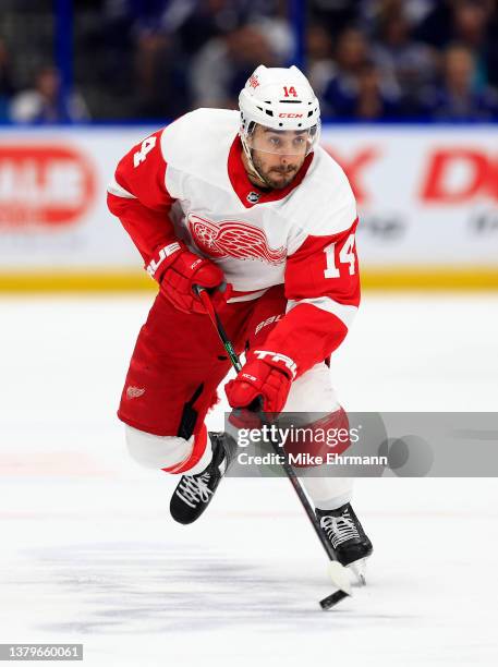 Robby Fabbri of the Detroit Red Wings looks to pass during a game against the Tampa Bay Lightning at Amalie Arena on March 04, 2022 in Tampa, Florida.