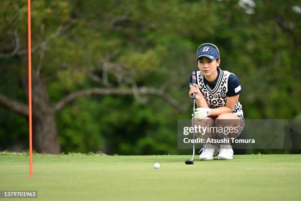 Rei Matsuda of Japan lines up a putt on the 10th green during the third round of the Daikin Orchid Ladies at Ryukyu Golf Club on March 5, 2022 in...