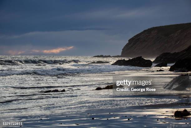 Sunset is obscured by gathering storm clouds along the horizon as viewed from Gaviota Beach State Park on March 3 in Gaviota, California. Because of...