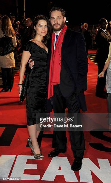 Actor Tom Hardy and Charlotte Riley attend the UK premiere of 'This Means War' at ODEON Kensington on January 30, 2012 in London, England.