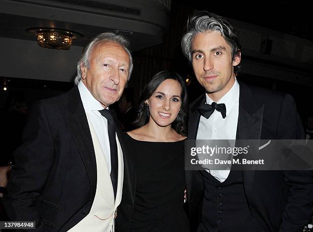 Harold Tillman, Meredith Tillman and George Lamb attend the Retail Trust London Ball at The Grosvenor House Hotel on January 30, 2012 in London,...