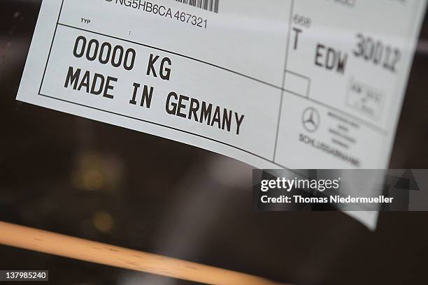 Sign reading "Made in Germany" is seen on a Daimler AG Mercedes-Benz S-class automobile along the production line inside the company's factory on...