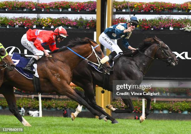 John Allen riding Hitotsu defeats Luke Nolen riding Lightsaber in Race 7, the Australian Guineas, during Melbourne Racing at Flemington Racecourse on...