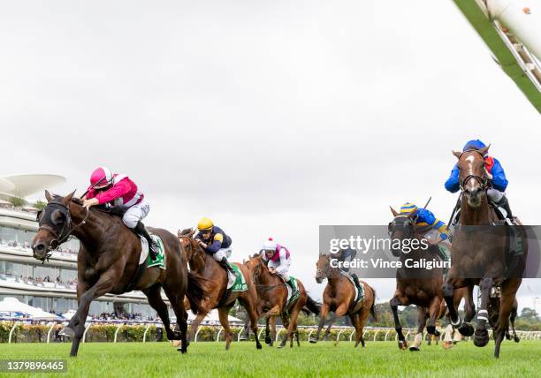 Damian Lane riding Inspirational Girl defeats Jamie Kah riding Zaaki in Race 6, the Tab Blamey Stakes, during Melbourne Racing at Flemington...