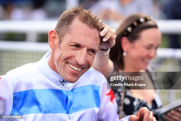 Hugh Bowman gets a pat on the head from wife Christine after winning race 7 the Furphy Canterbury Stakes on Forbidden Love during Sydney Racing at...