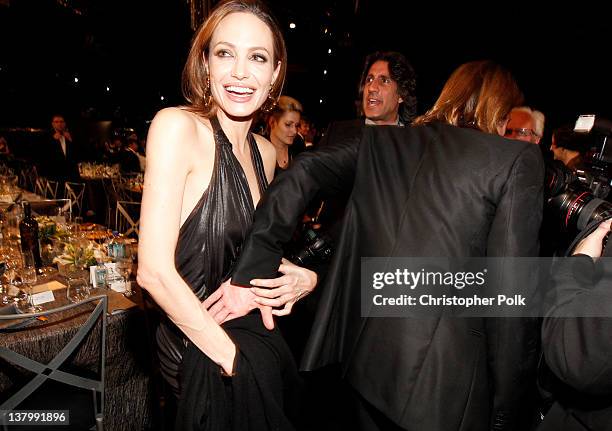 Actors Brad Pitt and Angelina Jolie attend The 18th Annual Screen Actors Guild Awards broadcast on TNT/TBS at The Shrine Auditorium on January 29,...