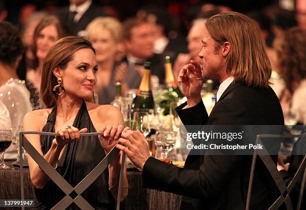 Actors Angelina Jolie and Brad Pitt attend The 18th Annual Screen Actors Guild Awards broadcast on TNT/TBS at The Shrine Auditorium on January 29,...