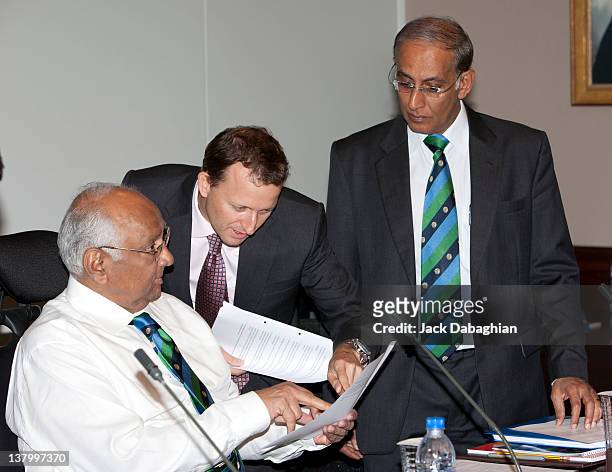 President Sharad Pawar convenes with Head of Legal and Company secretary, David Becker as Chief Executive Haroon Lorgat looks on prior to the...