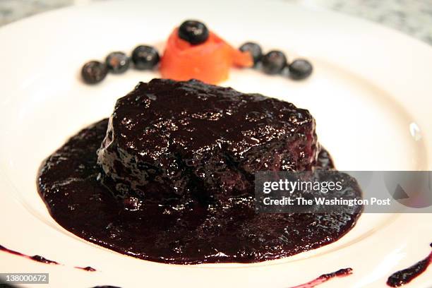 The Filetto al Mirtillo -- a filet mignon drizzled with a not-too-sweet blueberry sauce -- is easily the most talked-about dish at Acqua Al 2, a...