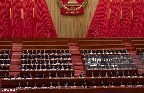 Chinese President Xi Jinping, centre, and members of the government take part in the opening session of the National Peoples Congress at the Great...