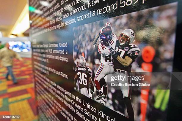 In the Indiana Convention Center, on the way to the NFL Experience, one of the displays features many boards that tout the history of the NFL. One...