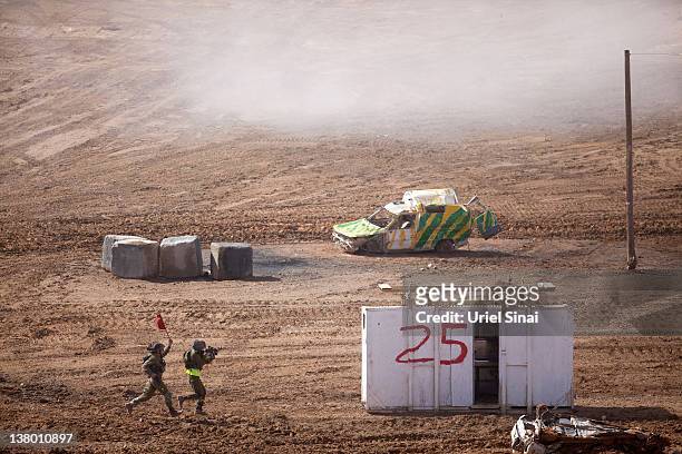 Israeli soldiers take part in an army exercise on at the Shizafon army base, in the Negev Desert north of the southern city of Eilat on January 31,...
