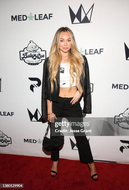 Corinne Olympios attends Baby Ape Social Club's 1st Annual Holder's Event on March 04, 2022 in Los Angeles, California.