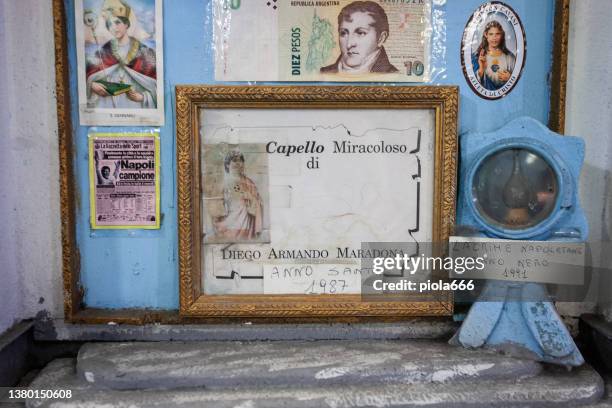 the miracolous hair of diego armando maradona in napoli - supersticion stock pictures, royalty-free photos & images