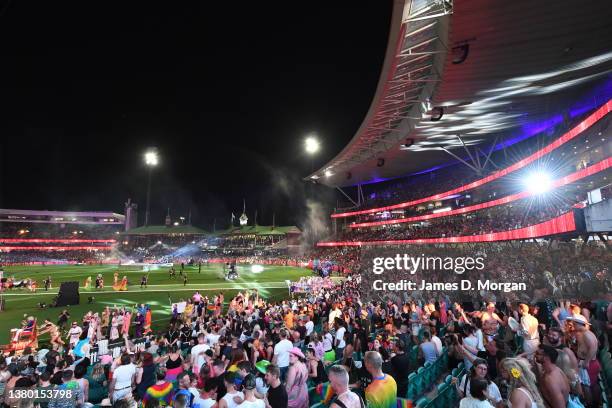Crowds inside the SCG watch the participants during the 44th Sydney Gay and Lesbian Mardi Gras Parade on March 05, 2022 in Sydney, Australia. The...