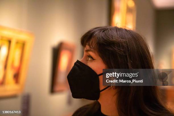 young woman at museum wearing ffp2 mask - covid hungary stock pictures, royalty-free photos & images