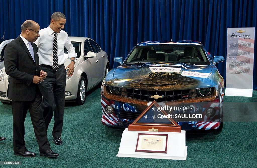 US President Barack Obama talks with Ed